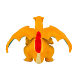 Peluche Dracaufeu de 25cm vue arrière avec ses ailes et sa queue vibrante en rouge.
