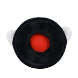 Peluche Bill Balle noire en tissu doux, avec un centre rouge vif et deux petites ailes blanches sur les côtés.
