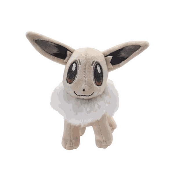 Peluche Évoli Shiny beige et crème en tissu doux, avec de longues oreilles, de grands yeux bruns et un col en fourrure blanche.