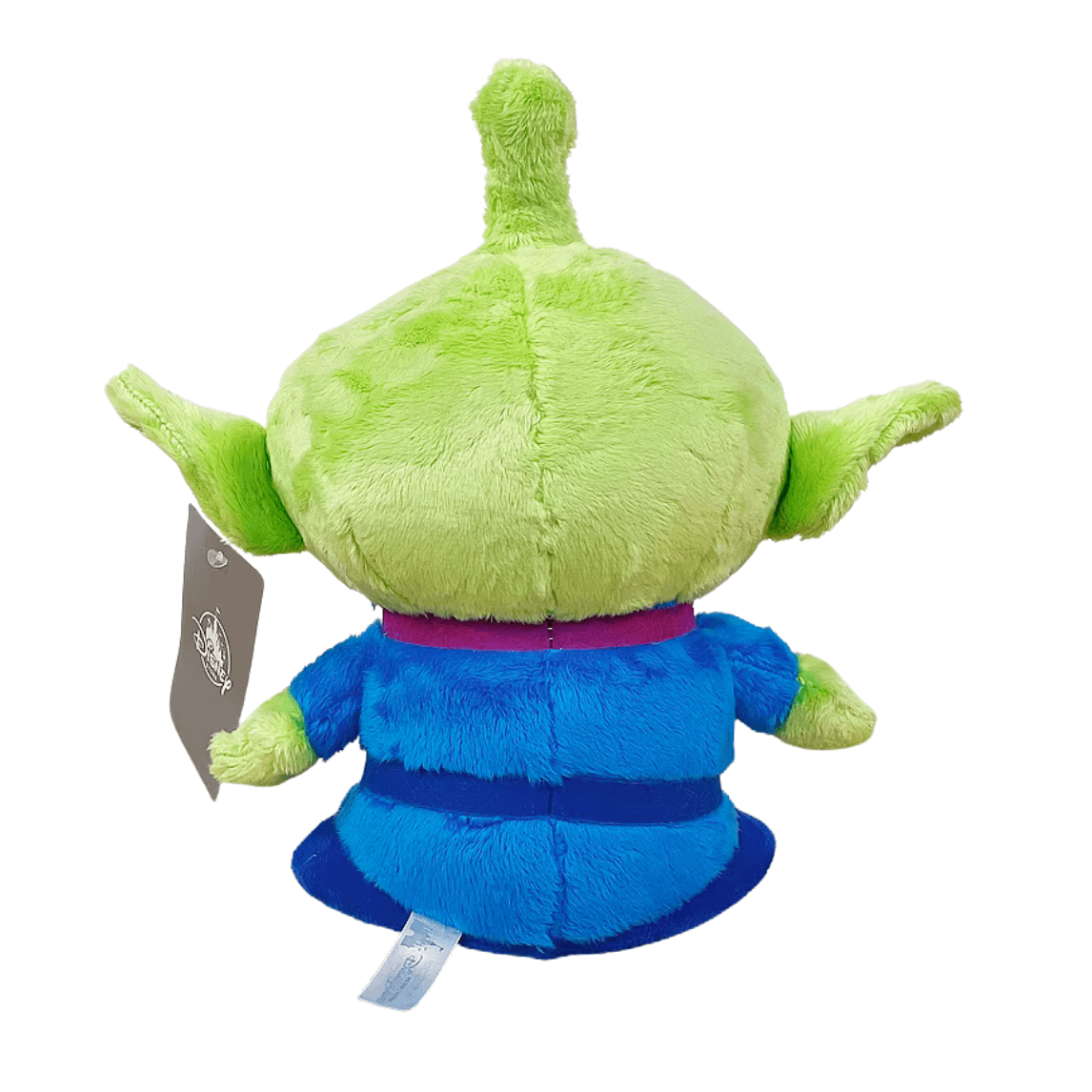 peluche Alien verte et bleue en tissu doux, vue de dos, avec une tête ronde, des oreilles pointues et une combinaison