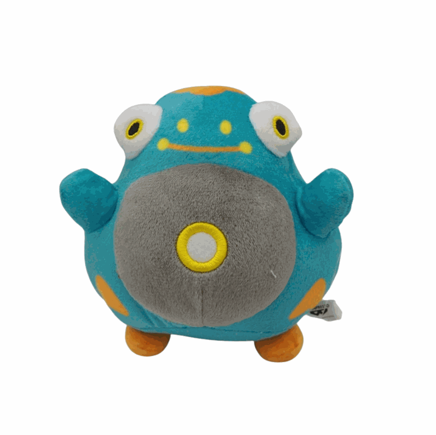 peluche Ampibidou turquoise et grise en tissu doux, avec des détails jaunes et orange et un grand nombril rond