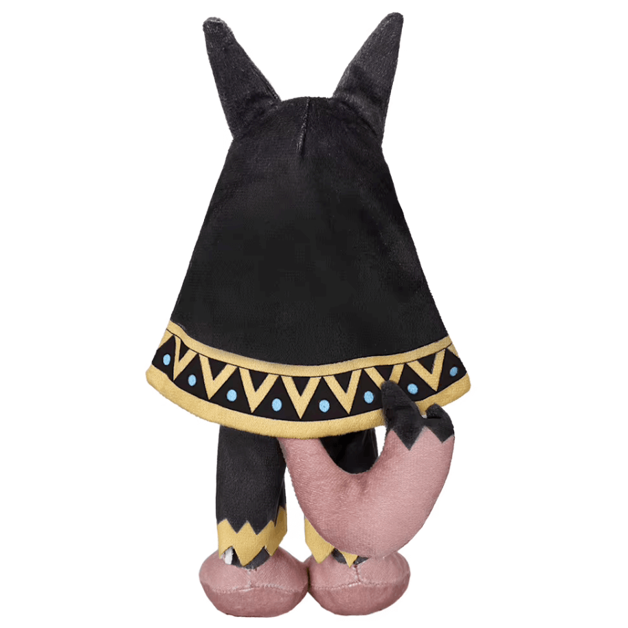peluche Anubis noire en tissu doux, ornée d’une bordure dorée à motifs triangulaires et de détails roses