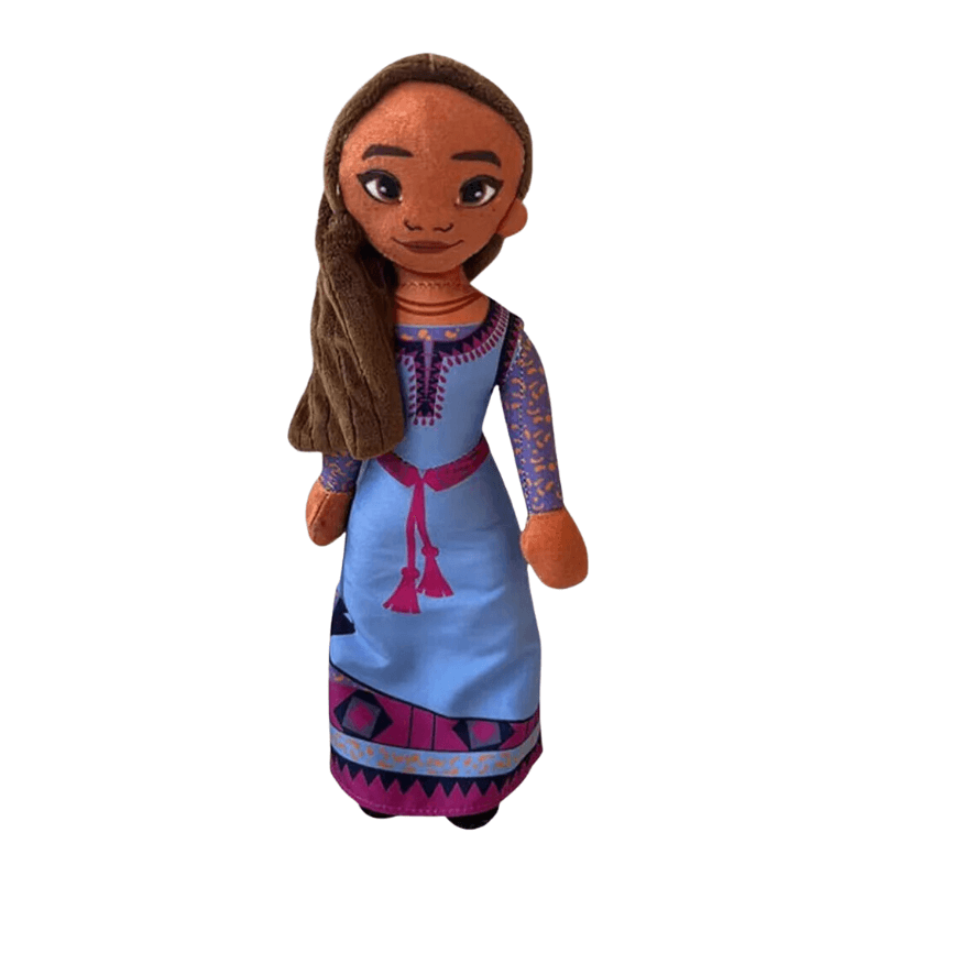 Peluche Asha à la peau brune, longue chevelure brune et robe bleue ornée de motifs violets et roses.