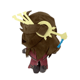 peluche Beidou en tissu marron avec cheveux volumineux, ornement jaune pâle et tenue bordeaux à détails noirs