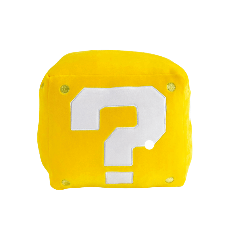 Peluche Bloc jaune en forme de cube, avec un grand point d’interrogation blanc et de petits détails dorés.