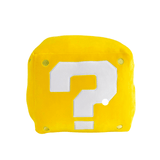 Peluche Bloc jaune en forme de cube, avec un grand point d’interrogation blanc et de petits détails dorés.