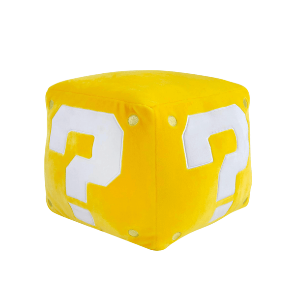 Peluche Bloc jaune en tissu doux, en forme de cube avec de grands points d’interrogation blancs sur les faces.