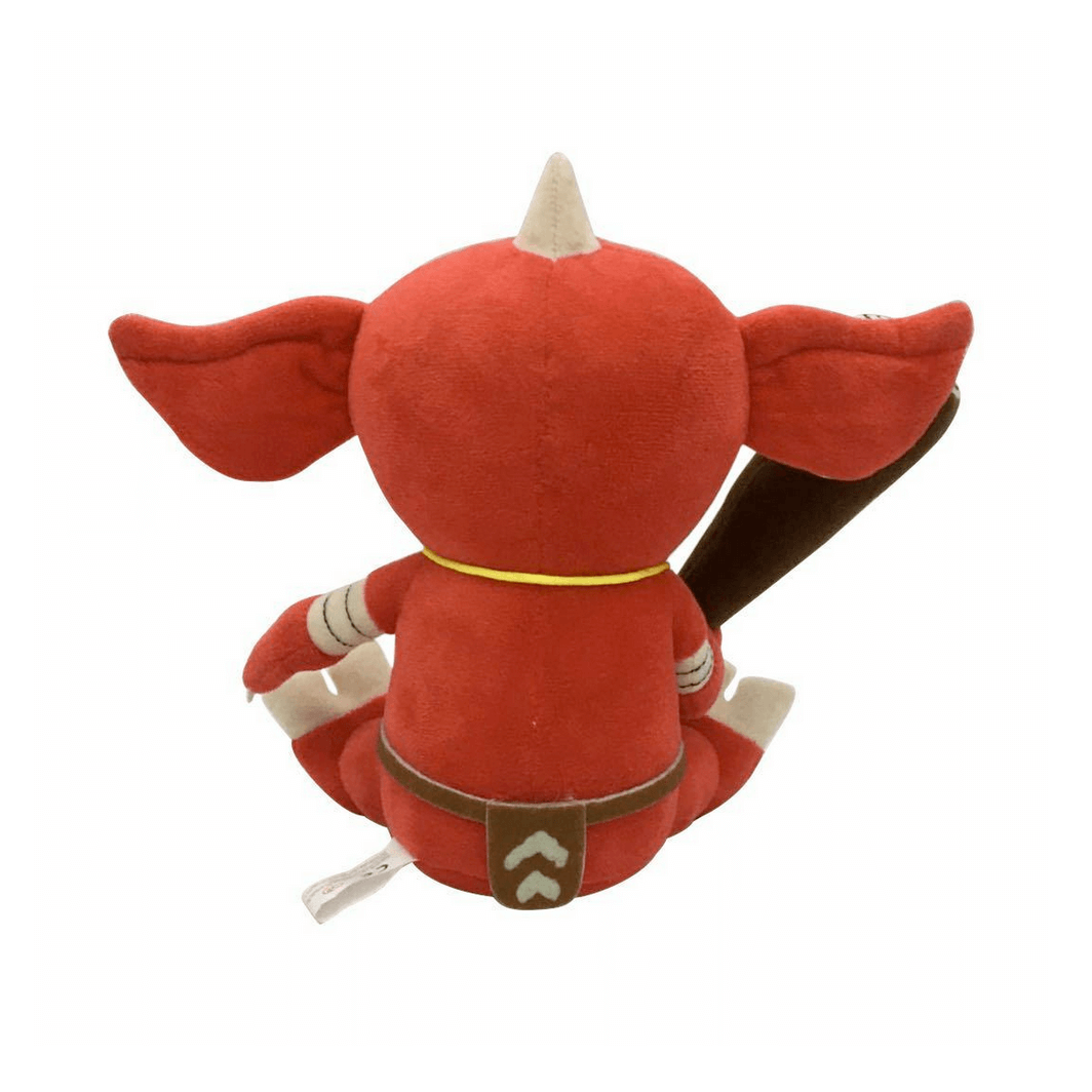 peluche Bokoblin rouge en tissu doux, vue de dos, avec de grandes oreilles, une corne beige et une ceinture jaune