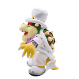 Peluche Bowser habillée en marié, avec costume blanc, haut-de-forme, gants jaunes et carapace brune à pointes