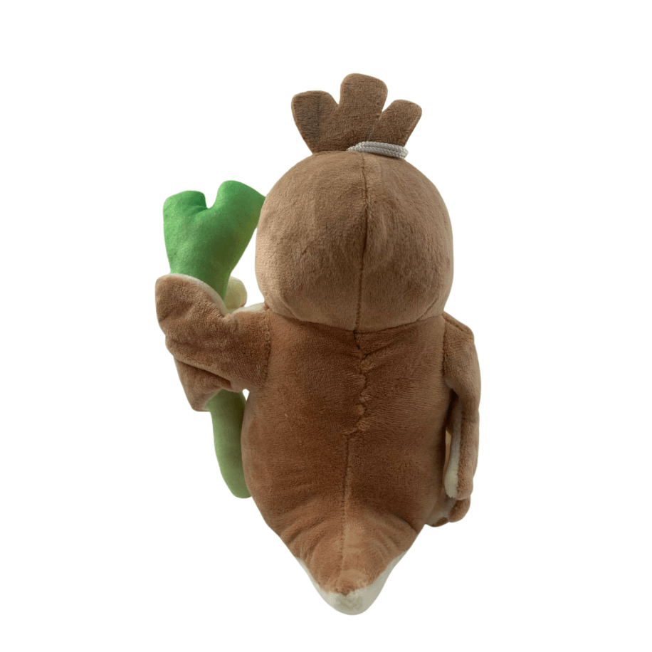Peluche Canarticho marron en tissu doux, vue de dos, tenant une grande tige verte à deux feuilles.