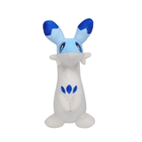 Peluche Chillet blanche et bleu clair en tissu doux, avec oreilles aux pointes bleu foncé et motifs bleus sur le ventre.