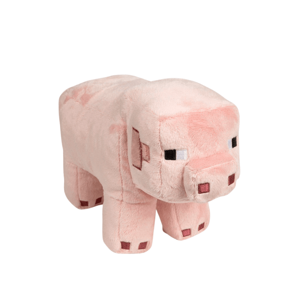 peluche Cochon rose en tissu doux, au corps cubique et aux détails pixelisés inspirés de Minecraft
