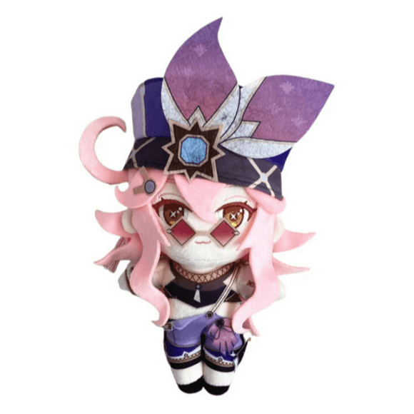 Peluche Dori aux cheveux roses, avec un grand chapeau violet orné d’une pierre bleue et une tenue violette et noire