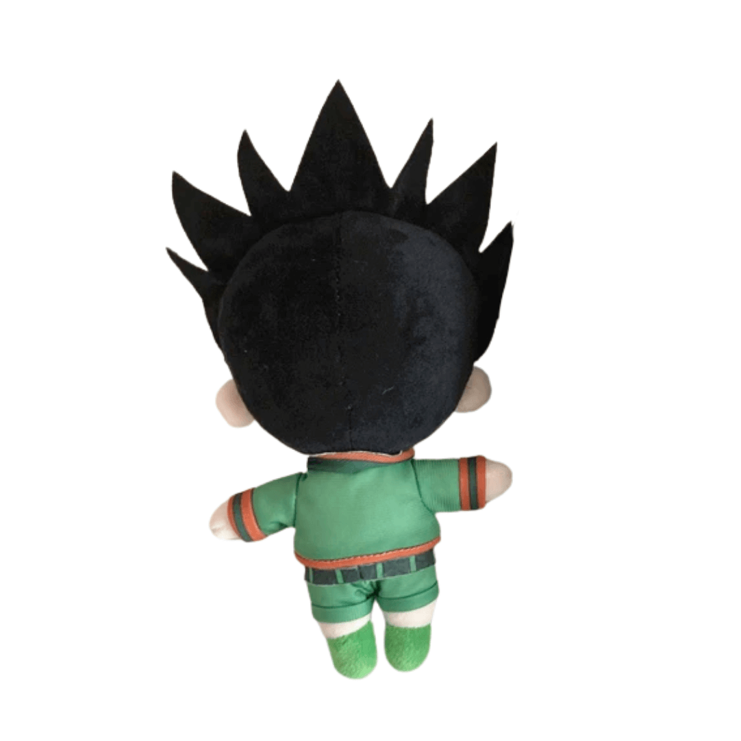 peluche Gon en tissu, vue de dos, avec une chevelure noire hérissée, une tenue verte à bordures orange et des bottes assorties.