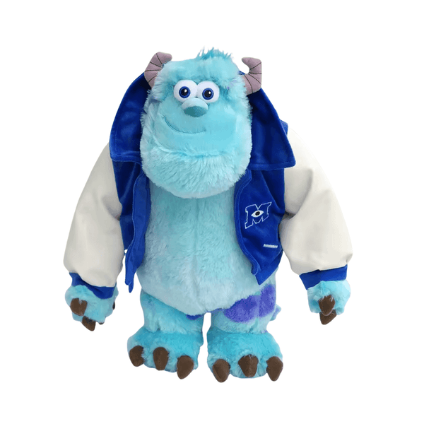 peluche Jacques Sullivan bleue à fourrure turquoise et taches violettes, avec cornes, grands yeux et veste bleue à manches blanches