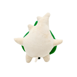 Peluche Korogu beige en tissu doux, vue de dos, avec une grande feuille verte visible sur les côtés.