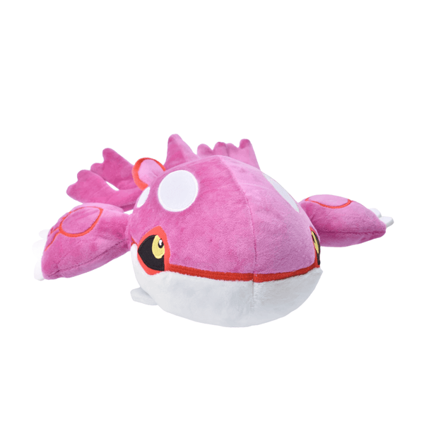 Peluche Kyogre Shiny rose en tissu doux, avec ventre blanc, marques rouges et yeux jaunes, aux larges nageoires.