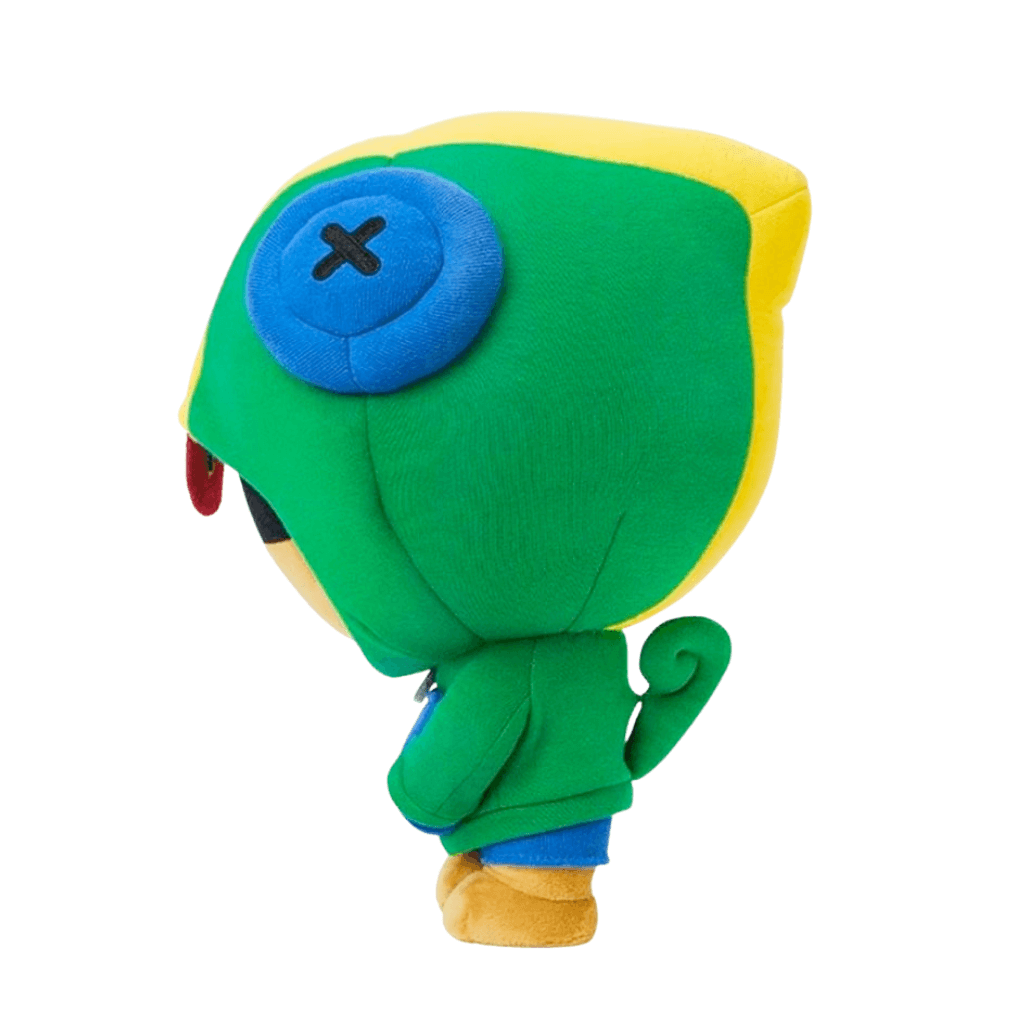 Peluche Leon verte et jaune en tissu doux, vue de dos avec capuche, œil bleu brodé d’une croix noire et queue recourbée.