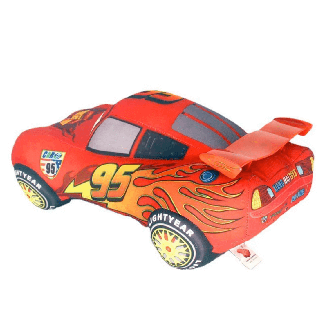 Peluche McQueen rouge en forme de voiture de course, avec le numéro 95, des flammes jaunes et des roues décorées.