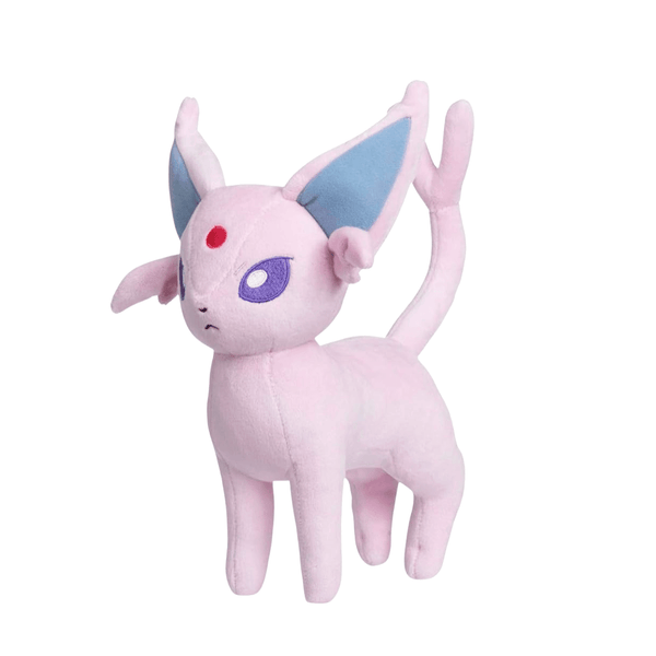 Peluche Mentali rose en tissu doux, avec de grandes oreilles bleues, des yeux violets et un point rouge au front.
