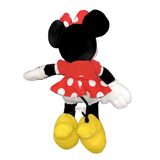 Peluche Minnie Mouse en tissu noir et blanc, robe rouge à pois blancs, nœud assorti et grandes chaussures jaunes, vue de dos.