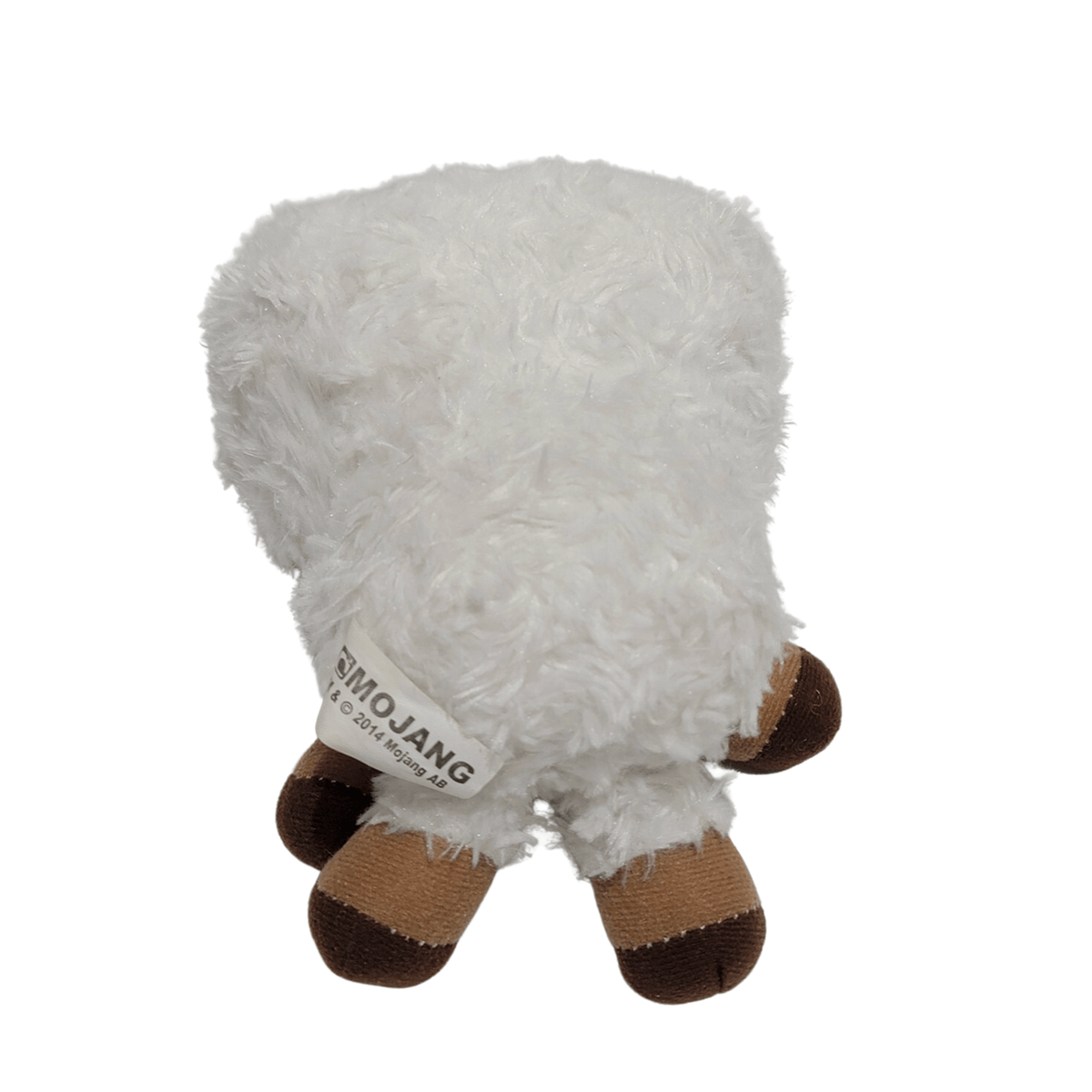 Peluche Mouton blanche en matière pelucheuse, avec quatre pattes brunes et une étiquette cousue sur le côté.
