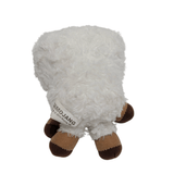 Peluche Mouton blanche en matière pelucheuse, avec quatre pattes brunes et une étiquette cousue sur le côté.