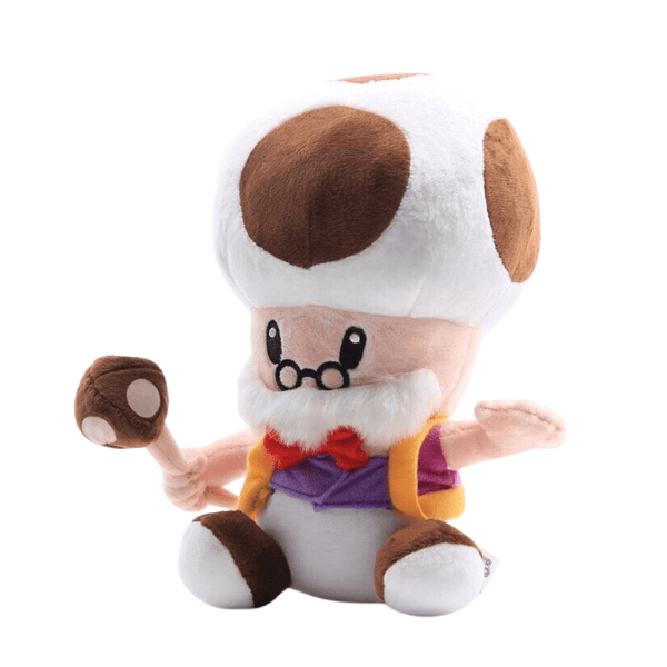 Peluche Papy Champi à grand chapeau blanc à taches brunes, barbe blanche, lunettes rondes et tenue violette et jaune.