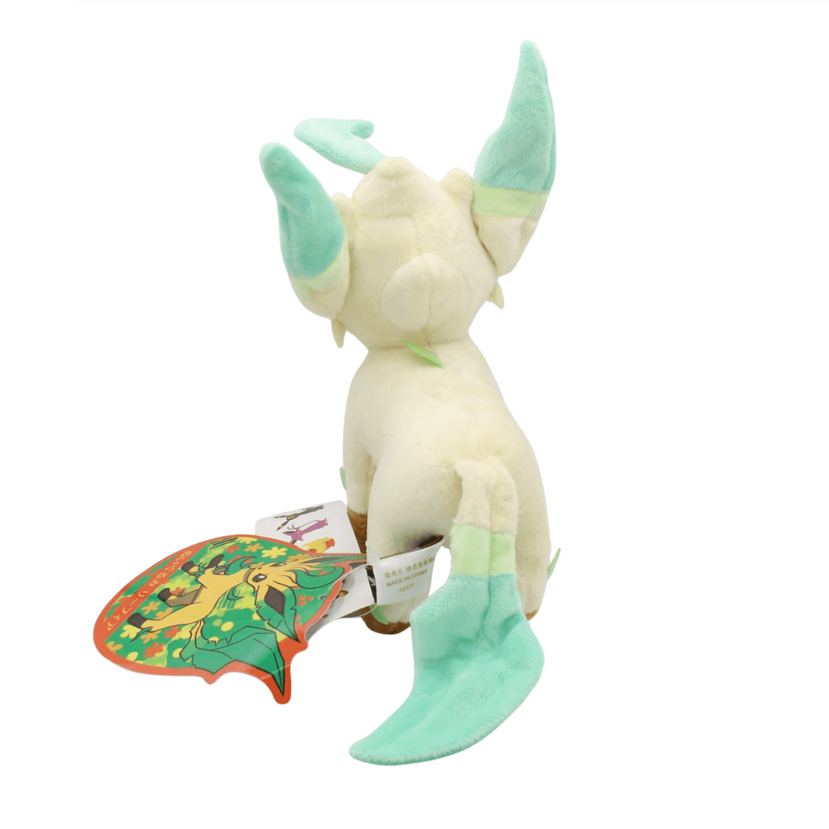 peluche Phyllali crème et vert menthe, avec de longues oreilles feuillues et une grande queue courbée