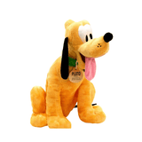 Peluche Pluto jaune en tissu doux, avec de longues oreilles noires, un museau allongé et la langue rose pendante.