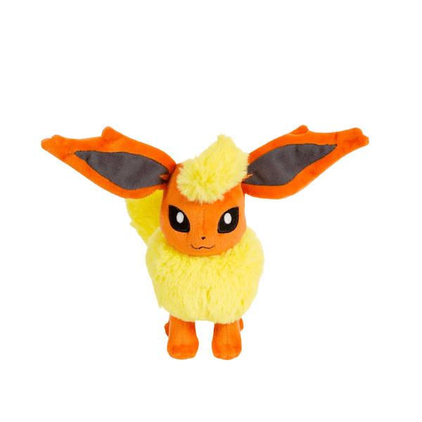peluche Pyroli orange et jaune en tissu doux, avec de grandes oreilles pointues, une collerette duveteuse et des yeux noirs