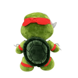 peluche Raphael verte en tissu doux, avec un bandeau rouge et une carapace brodée vert foncé au dos