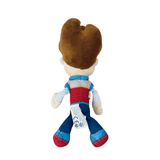 peluche Ryder vue de dos, aux cheveux bruns et vêtue d’un gilet rouge et bleu avec un pantalon assorti