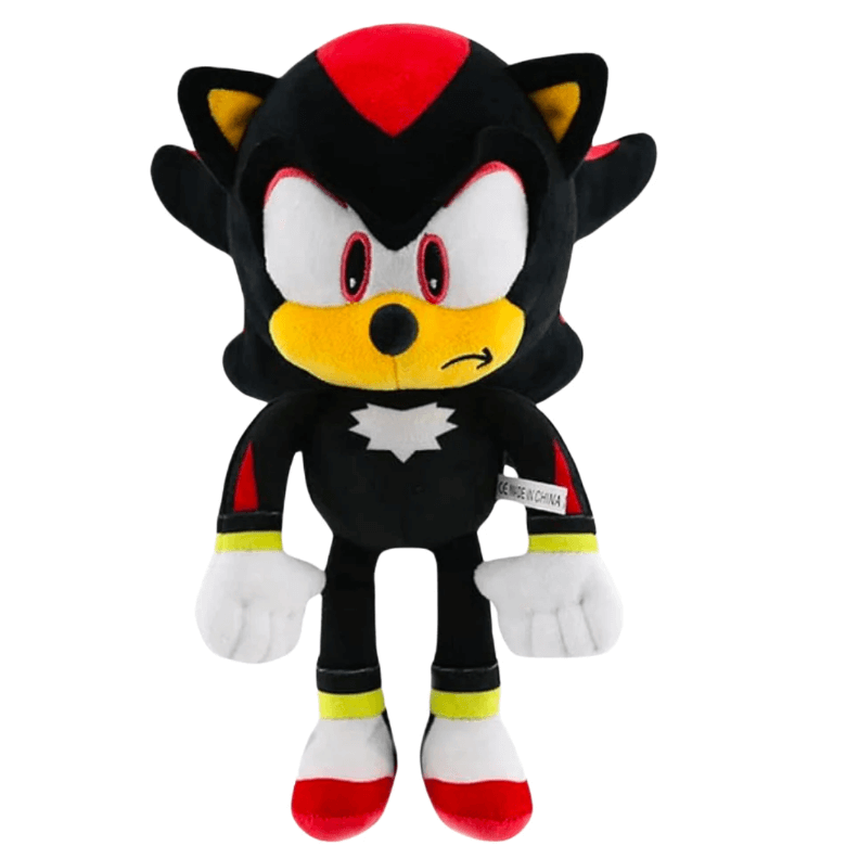 peluche Shadow en tissu noir avec des touches rouges, jaunes et blanches, grands yeux brodés et chaussures rouges