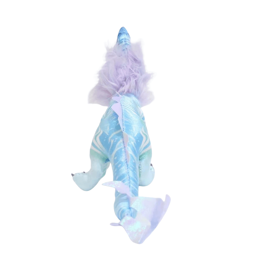 Peluche Sisu bleu turquoise et lilas, au corps écailleux, avec une crinière duveteuse et une longue queue.