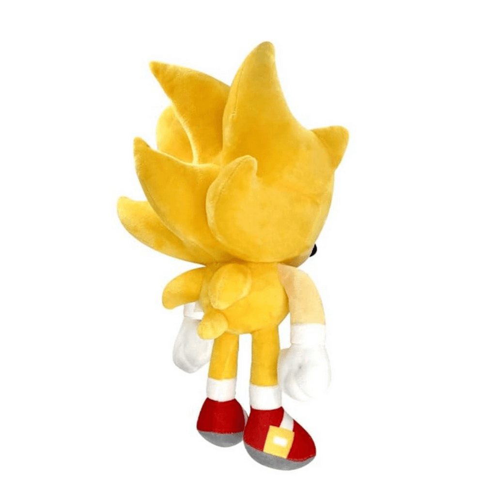 Peluche Super Sonic jaune doré, en tissu doux, avec des piquants dressés, des gants blancs et des chaussures rouges.