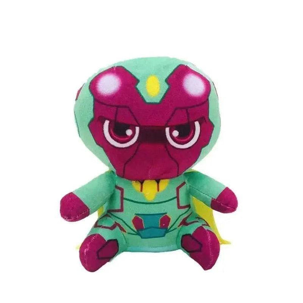 Peluche Vision vert d’eau et rose magenta, en tissu doux, avec détails jaunes, visage brodé et cape jaune.
