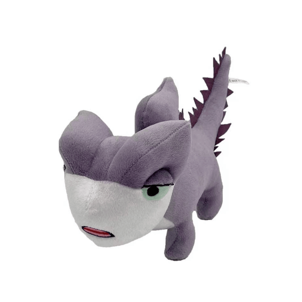 Peluche Zoé, lézard en tissu gris violet et blanc, avec de grands yeux verts, une crête et une longue queue épineuse.