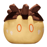 Peluche peluches Blob beige et brun en tissu doux, avec trois protubérances, des yeux ovales orange et des marques blanches.