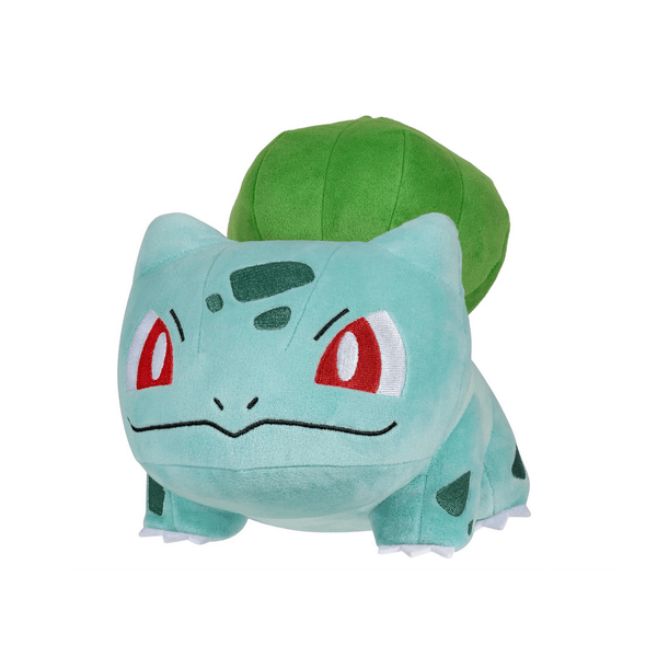 Peluches Bulbizarre en peluche turquoise et verte, avec de grands yeux rouges et une graine verte sur le dos.