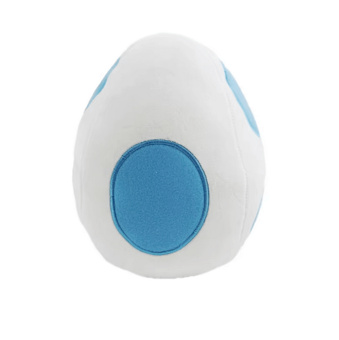 Peluche œuf Yoshi blanc en tissu doux, ornée d’un grand motif ovale bleu sur le devant et de détails bleus latéraux.