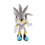 Peluche Silver the Hedgehog en tissu gris, blanc et jaune, avec des chaussures noires à bouts turquoise et des yeux jaunes.